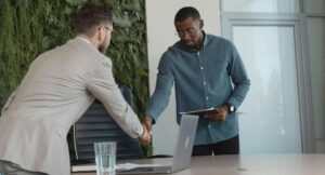 CFO meeting with cost reduction consulting expert to review tax discrepancies