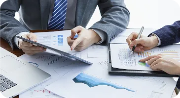 businessmen-elegant-suits-business-meeting-discussing-new-project-office
