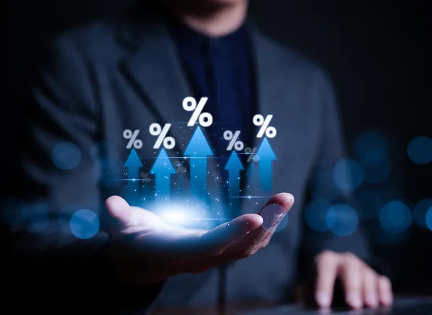 businessman-hand-with-rising-arrow-percentage-icon-interest-rate-dividend-concept-business-finance-money-concept-investment-growth-return-stocks-mutual-funds-profitability