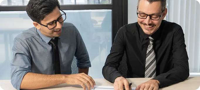 businessman-putting-down-money-pointing-with-pen-showing-candlestick-symbol-investing-finance-saving-money-interest-rate-dividend-investment-business-growth-concept