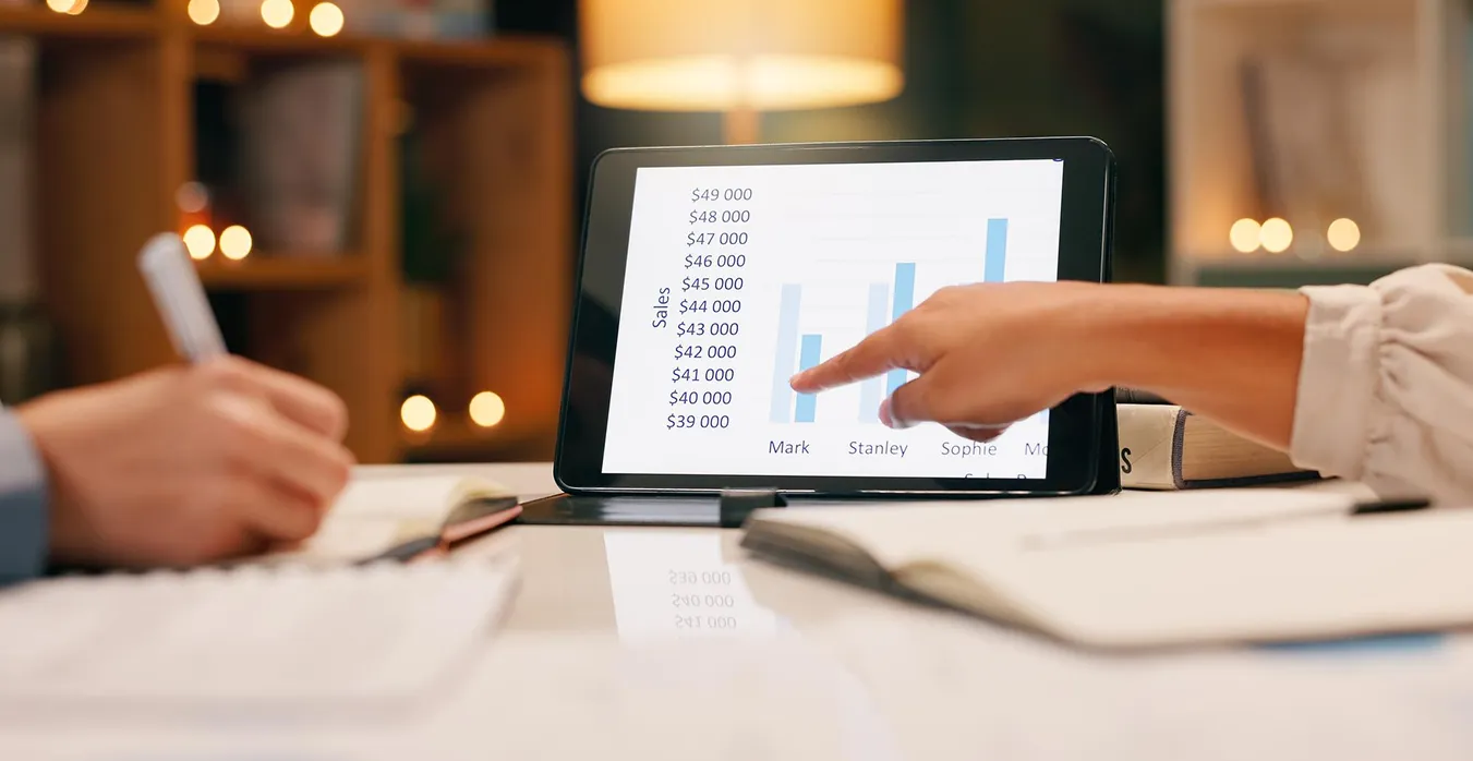 closeup-accountant-hands-counting-calculator