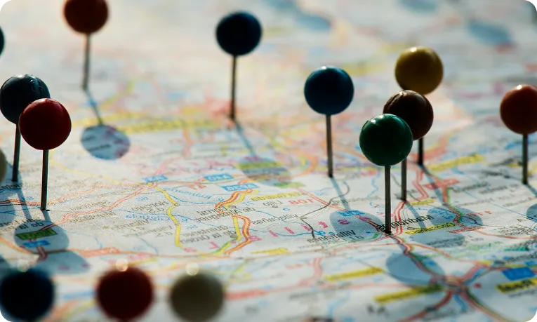 closeup-pins-map-planning-travel-journey 1