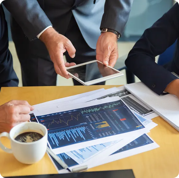 unrecognizable-business-partners-working-with-statistic-charts-businessman-holding-tablet-professional-content-businesswoman-making-notes-statistics-communication-partnership-concept