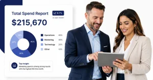 Executives reviewing a total spend dashboard to assess vendor costs, overpayments, and cash-flow leakage as part of business spend control.