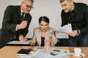 Manufacturing executive reviewing operating cost savings dashboard